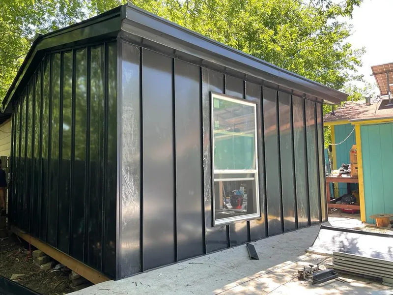 Black standing seam metal wall panels for Roof Inspection in Lake in the Hills